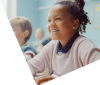 young african american girl with braces in classroom