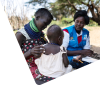 child and mother receiving checkup