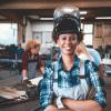 african american woman welder smiling