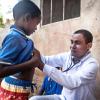 doctor listening to child&#039;s chest